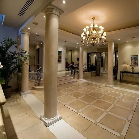 فندق Curium Palace 4*